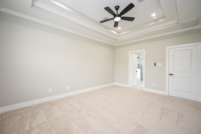 635 Lily St, Prairie View, TX 77484 - empty room with a tray ceiling, crown molding, light colored carpet, ceiling fan, and recessed lighting