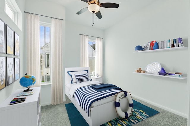 bedroom with carpet, baseboards, and ceiling fan