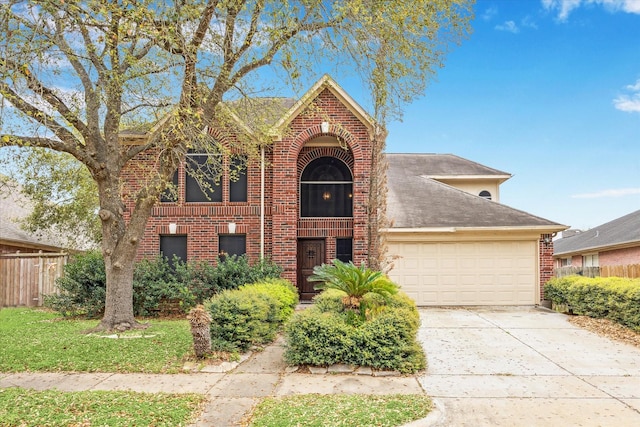 16023 Williwaw Dr, Houston, TX 77083 - view of front of home with a garage, brick siding, and concrete driveway
