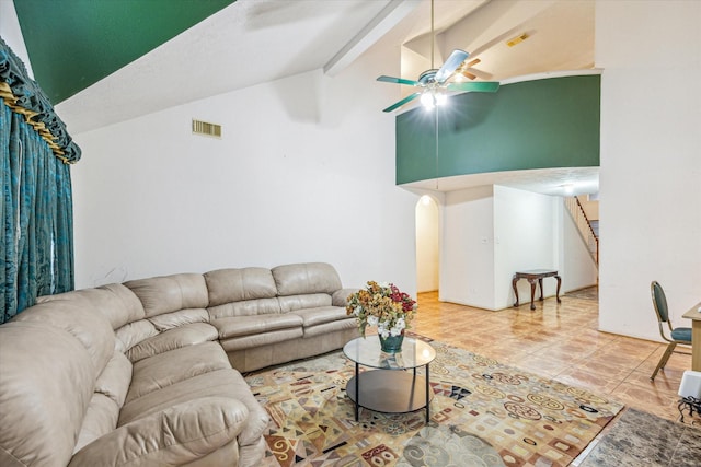 16023 Williwaw Dr, Houston, TX 77083 - living room featuring stairs, arched walkways, beam ceiling, ceiling fan, and visible vents