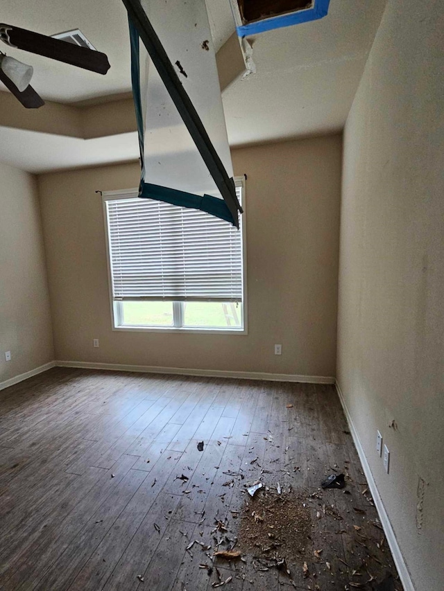 1710 Penina Dr, Crosby, TX 77532 - unfurnished room featuring hardwood / wood-style floors, baseboards, visible vents, and ceiling fan