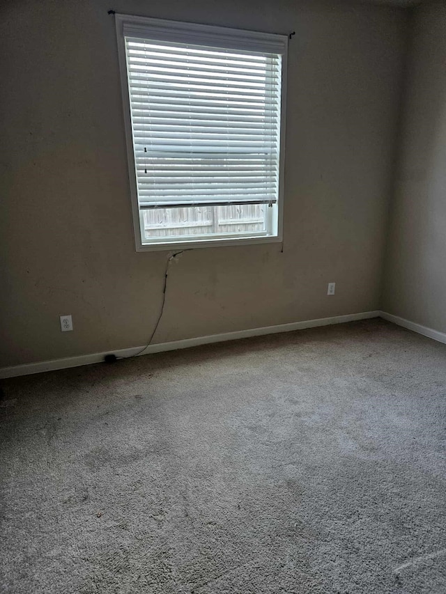 1710 Penina Dr, Crosby, TX 77532 - empty room with carpet and baseboards