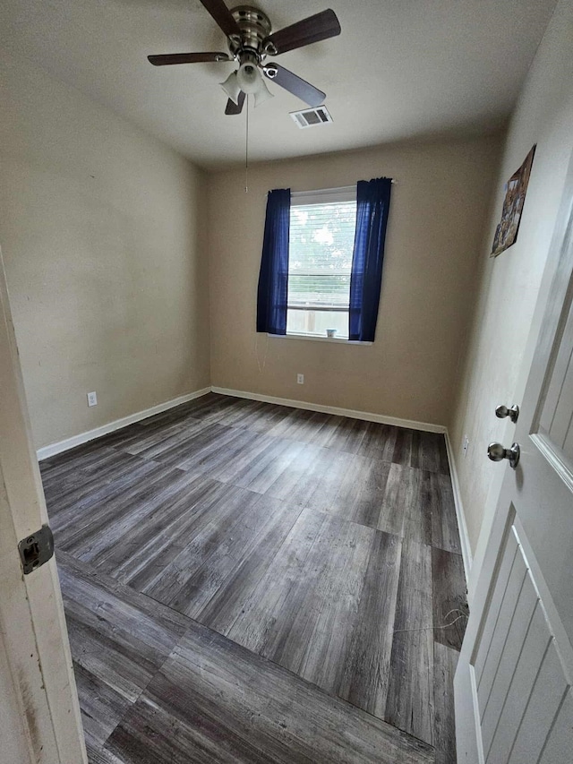 1710 Penina Dr, Crosby, TX 77532 - spare room featuring baseboards, wood finished floors, visible vents, and ceiling fan