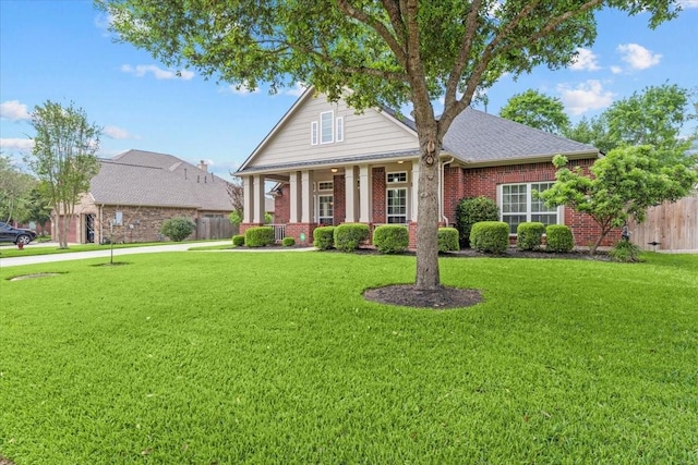 2052 Doolan Dr, Conroe, TX 77301 - neoclassical home with brick siding and covered porch