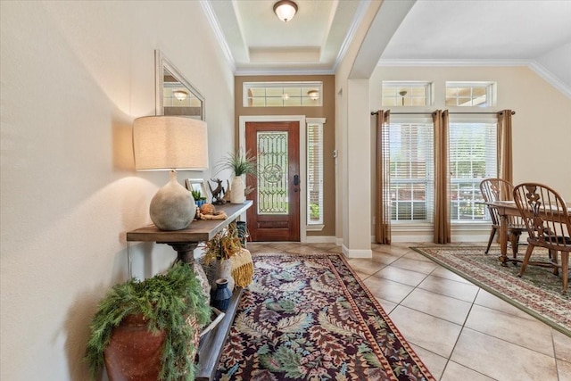 2052 Doolan Dr, Conroe, TX 77301 - foyer entrance with crown molding, light tile patterned floors, and baseboards
