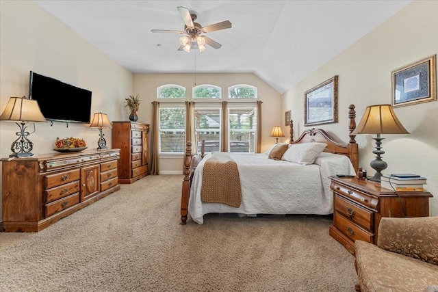 2052 Doolan Dr, Conroe, TX 77301 - bedroom with light colored carpet, vaulted ceiling, and ceiling fan
