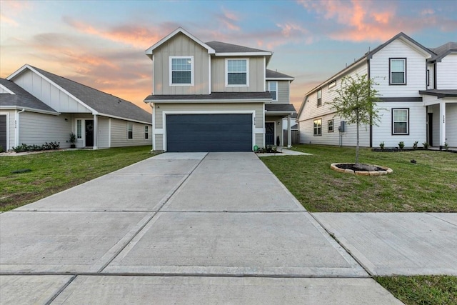 5510 Brooklyn Rose Dr, Rosharon, TX 77583 - traditional home with board and batten siding, an attached garage, driveway, and a yard