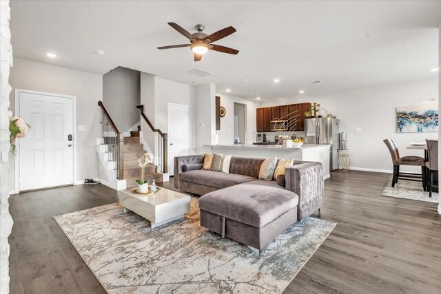 5510 Brooklyn Rose Dr, Rosharon, TX 77583 - living area with a ceiling fan, dark wood finished floors, baseboards, stairs, and recessed lighting