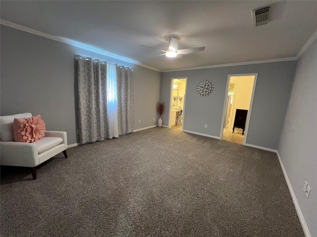 unfurnished room featuring visible vents, baseboards, ceiling fan, carpet, and crown molding