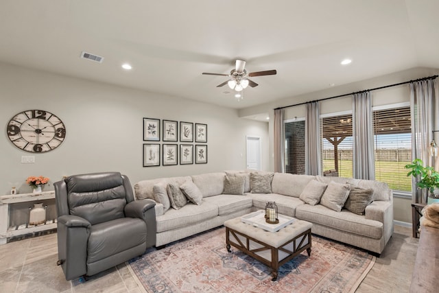 living area featuring ceiling fan, visible vents, and recessed lighting