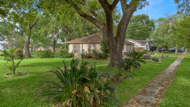 exterior space with a yard
