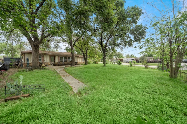 view of yard with fence