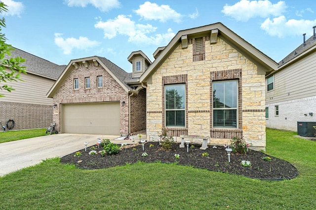 13710 Alaskan Brown Bear Trl, Crosby, TX 77532 - craftsman inspired home featuring stone siding, central AC, a front lawn, concrete driveway, and an attached garage