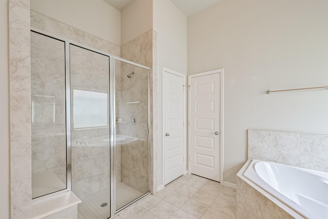 13710 Alaskan Brown Bear Trl, Crosby, TX 77532 - full bathroom featuring a stall shower, tile patterned flooring, and a bath