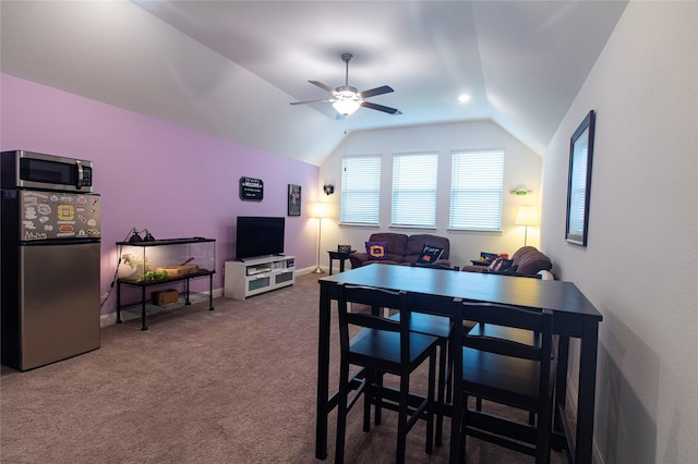 1627 Carriage Oaks Ln, Katy, TX 77494 - carpeted dining area with baseboards, a ceiling fan, and lofted ceiling