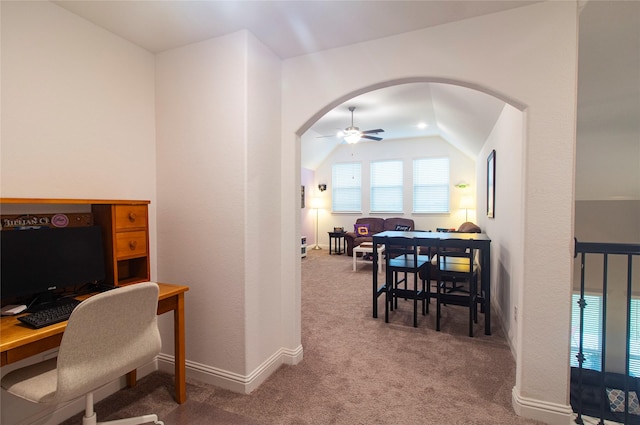 1627 Carriage Oaks Ln, Katy, TX 77494 - carpeted home office featuring baseboards, a ceiling fan, arched walkways, and vaulted ceiling