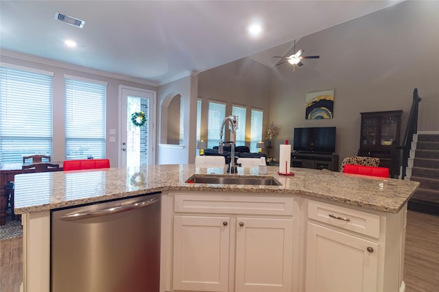 1627 Carriage Oaks Ln, Katy, TX 77494 - kitchen with visible vents, dishwasher, a sink, open floor plan, and a ceiling fan