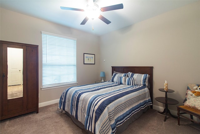 1627 Carriage Oaks Ln, Katy, TX 77494 - bedroom featuring baseboards, multiple windows, carpet flooring, and ceiling fan