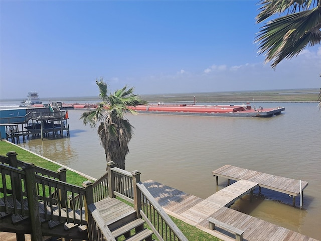 dock area featuring a water view