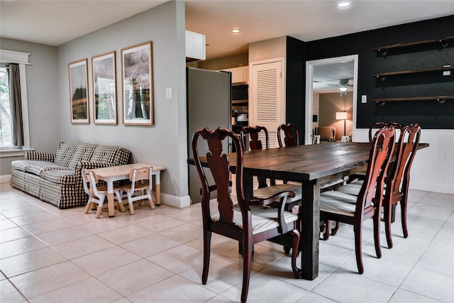 dining area featuring baseboards, ceiling fan, recessed lighting, and light tile patterned floors