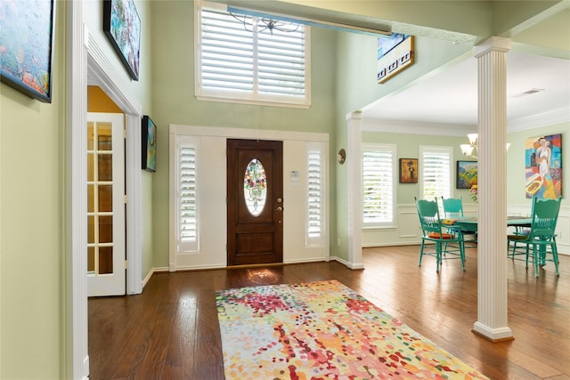 12510 Beauline Abbey St, Tomball, TX 77377 - foyer entrance with crown molding, hardwood / wood-style floors, and decorative columns