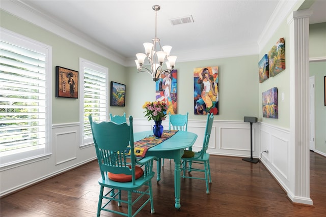 12510 Beauline Abbey St, Tomball, TX 77377 - dining room with a wainscoted wall, wood finished floors, visible vents, a chandelier, and crown molding