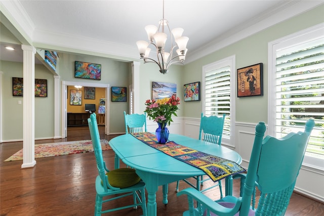 12510 Beauline Abbey St, Tomball, TX 77377 - dining room featuring dark wood finished floors, a chandelier, crown molding, and a wainscoted wall