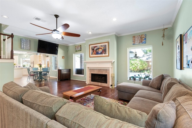 12510 Beauline Abbey St, Tomball, TX 77377 - living room with ceiling fan, plenty of natural light, dark wood-type flooring, and ornamental molding