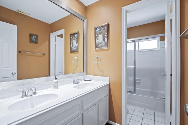 12510 Beauline Abbey St, Tomball, TX 77377 - full bath with a sink, double vanity, visible vents, and tile patterned floors
