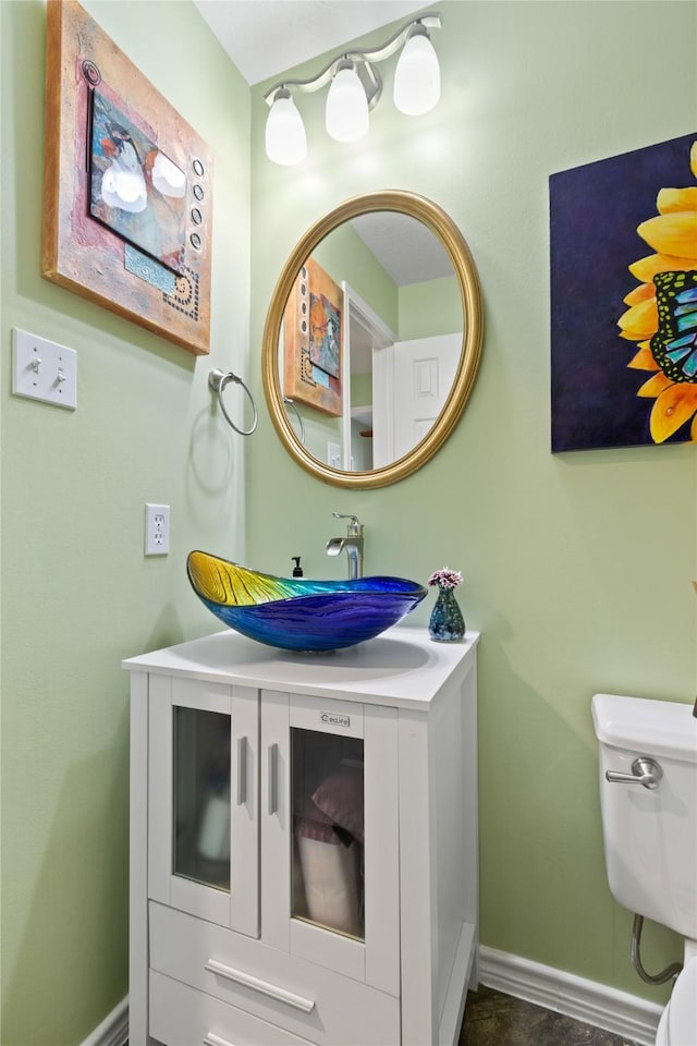 12510 Beauline Abbey St, Tomball, TX 77377 - half bathroom with baseboards, vanity, and toilet