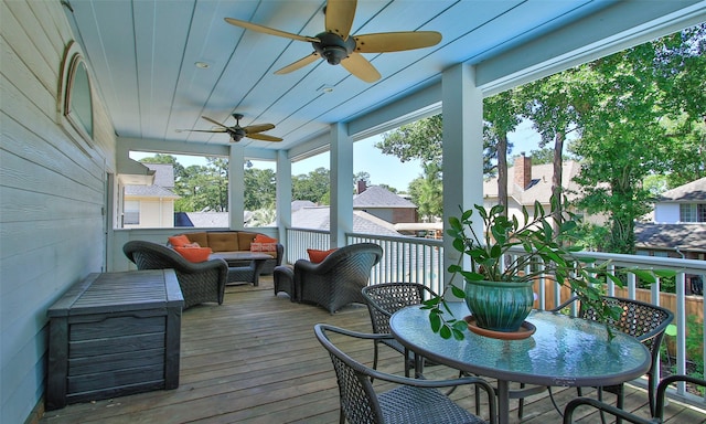 12510 Beauline Abbey St, Tomball, TX 77377 - deck with an outdoor hangout area, outdoor dining space, and ceiling fan
