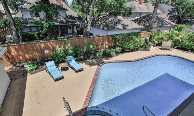 12510 Beauline Abbey St, Tomball, TX 77377 - view of swimming pool featuring a patio area, a fenced in pool, and a fenced backyard