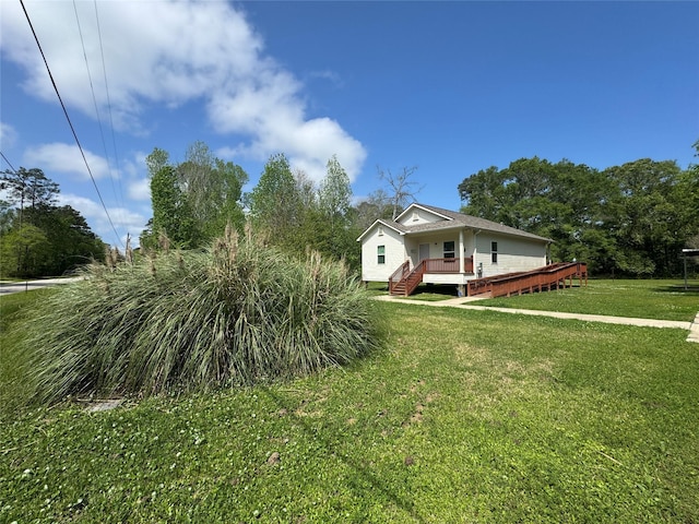 208 County Road 308, Cleveland, TX 77327 - exterior space with a deck