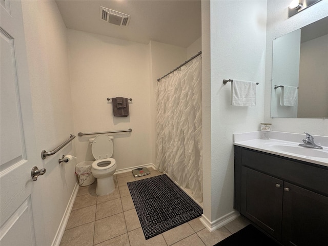 208 County Road 308, Cleveland, TX 77327 - full bath featuring toilet, vanity, tile patterned flooring, baseboards, and visible vents