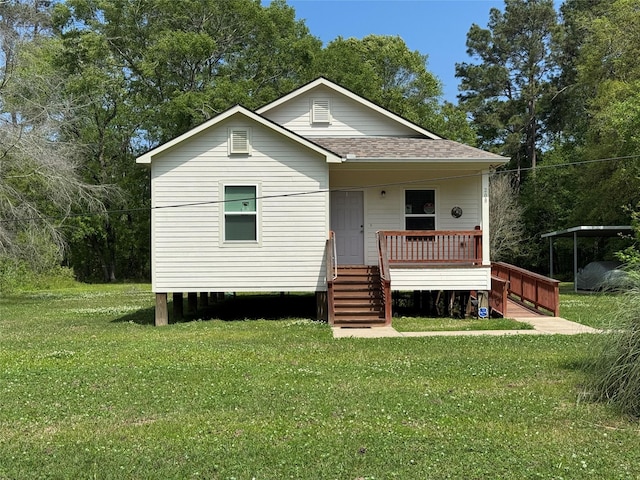 208 County Road 308, Cleveland, TX 77327 - bungalow featuring a front lawn, a shingled roof, and a wooden deck
