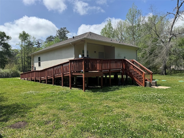 208 County Road 308, Cleveland, TX 77327 - rear view of property with a deck and a yard