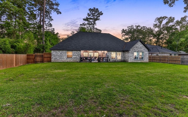 2711 Constantine St, New Caney, TX 77357 - view of back of house at dusk