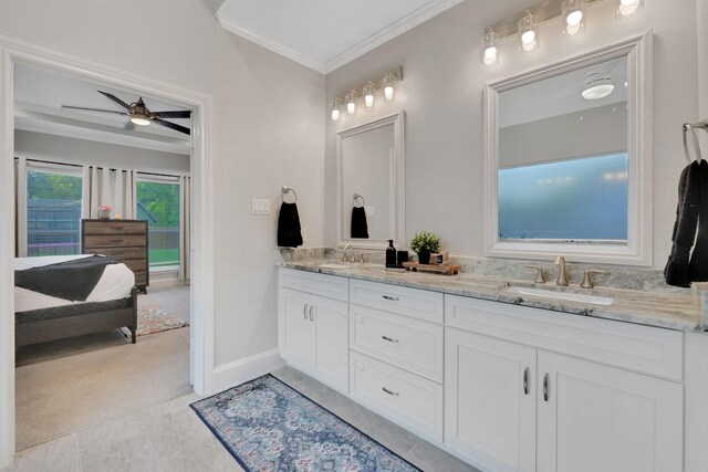 2711 Constantine St, New Caney, TX 77357 - full bath with connected bathroom, crown molding, a ceiling fan, double vanity, and baseboards