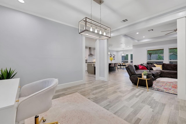 2711 Constantine St, New Caney, TX 77357 - living area featuring light wood finished floors, crown molding, recessed lighting, baseboards, and ceiling fan