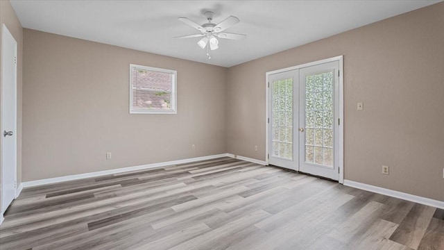 1302 20th St, Huntsville, TX 77340 - spare room with ceiling fan, wood finished floors, and baseboards