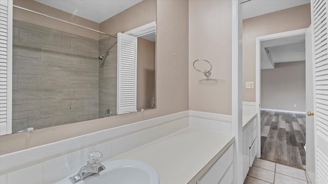 1302 20th St, Huntsville, TX 77340 - bathroom featuring tile patterned flooring and vanity