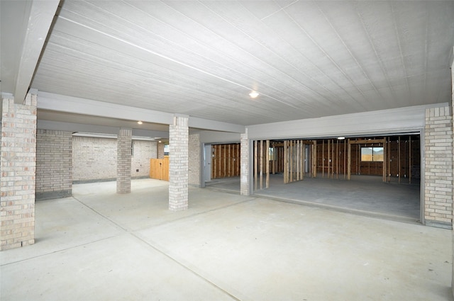 2101 Amistad Rd, League City, TX 77539 - below grade area featuring brick wall