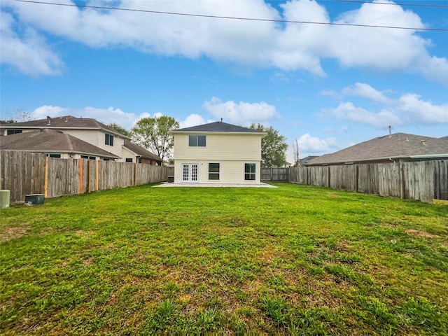 19431 Cypress Royal Dr, Katy, TX 77449 - back of property with french doors and a patio area