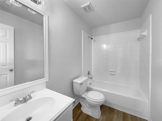 19431 Cypress Royal Dr, Katy, TX 77449 - bathroom with wood finished floors, toilet, shower / bathtub combination, and vanity