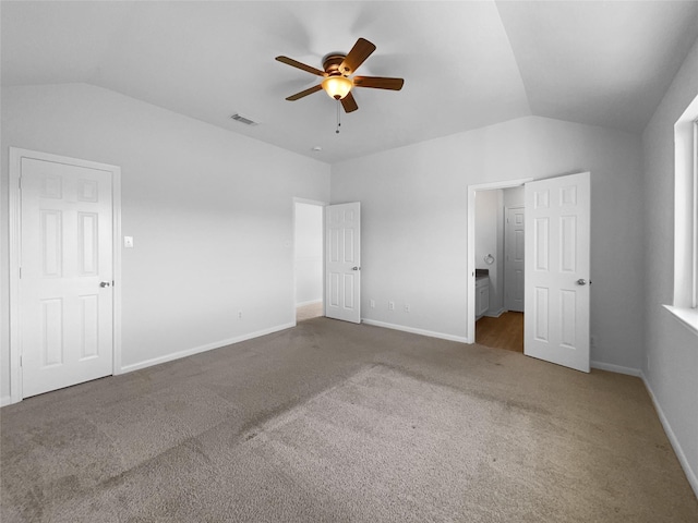 19431 Cypress Royal Dr, Katy, TX 77449 - unfurnished bedroom with vaulted ceiling, carpet, baseboards, and ceiling fan