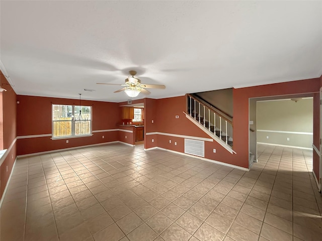 unfurnished living room with light tile patterned flooring, stairs, baseboards, visible vents, and ceiling fan