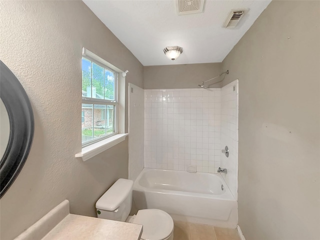 bathroom with visible vents, toilet, vanity, and bathing tub / shower combination