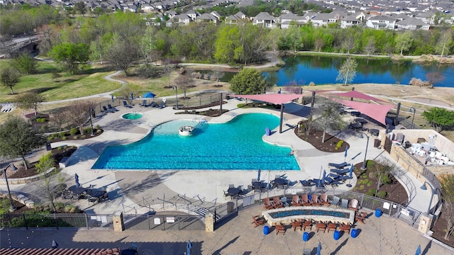 5314 Tribolo Trl, Round Rock, TX 78665 - view of swimming pool with a residential view, a water view, fence, and a patio area