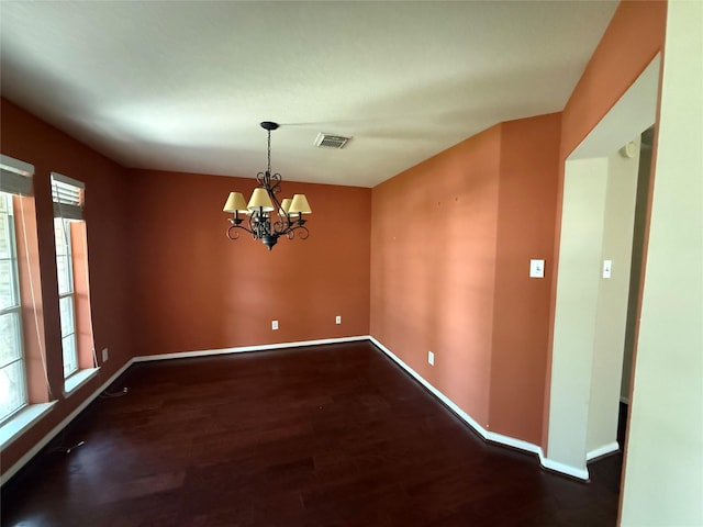 3307 Manor Tree Ln SW, Houston, TX 77068 - spare room with wood finished floors and a chandelier