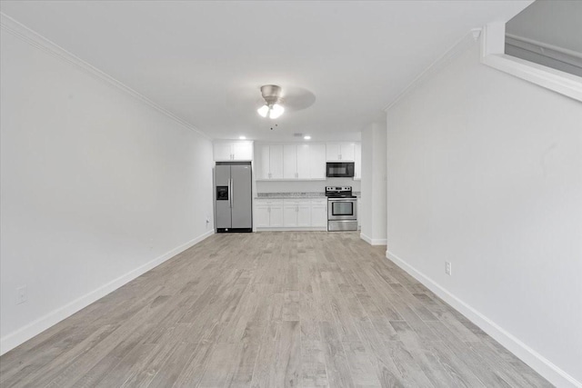 9566 Windswept Ln Unit 9566, Houston, TX 77063 - unfurnished living room featuring crown molding, light wood-style flooring, and a ceiling fan
